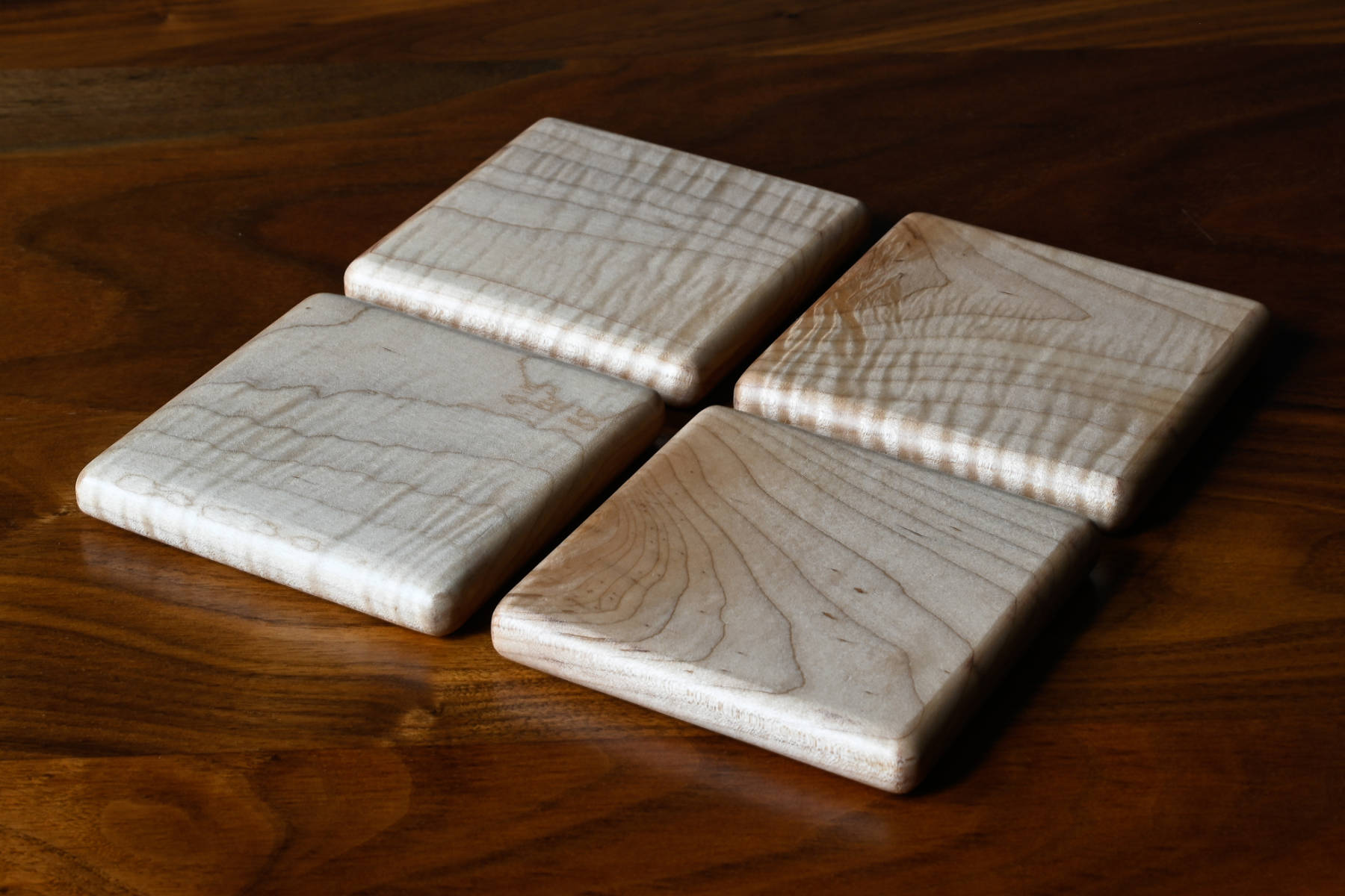 Nord Lion curly maple coasters