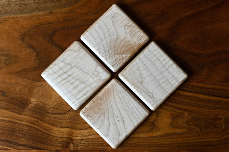 Nord Lion curly maple coasters