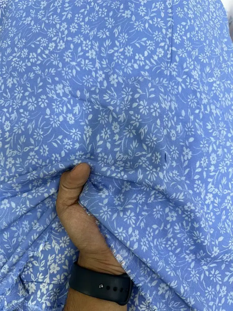 Rayon Small White Floral Print On Light Blue