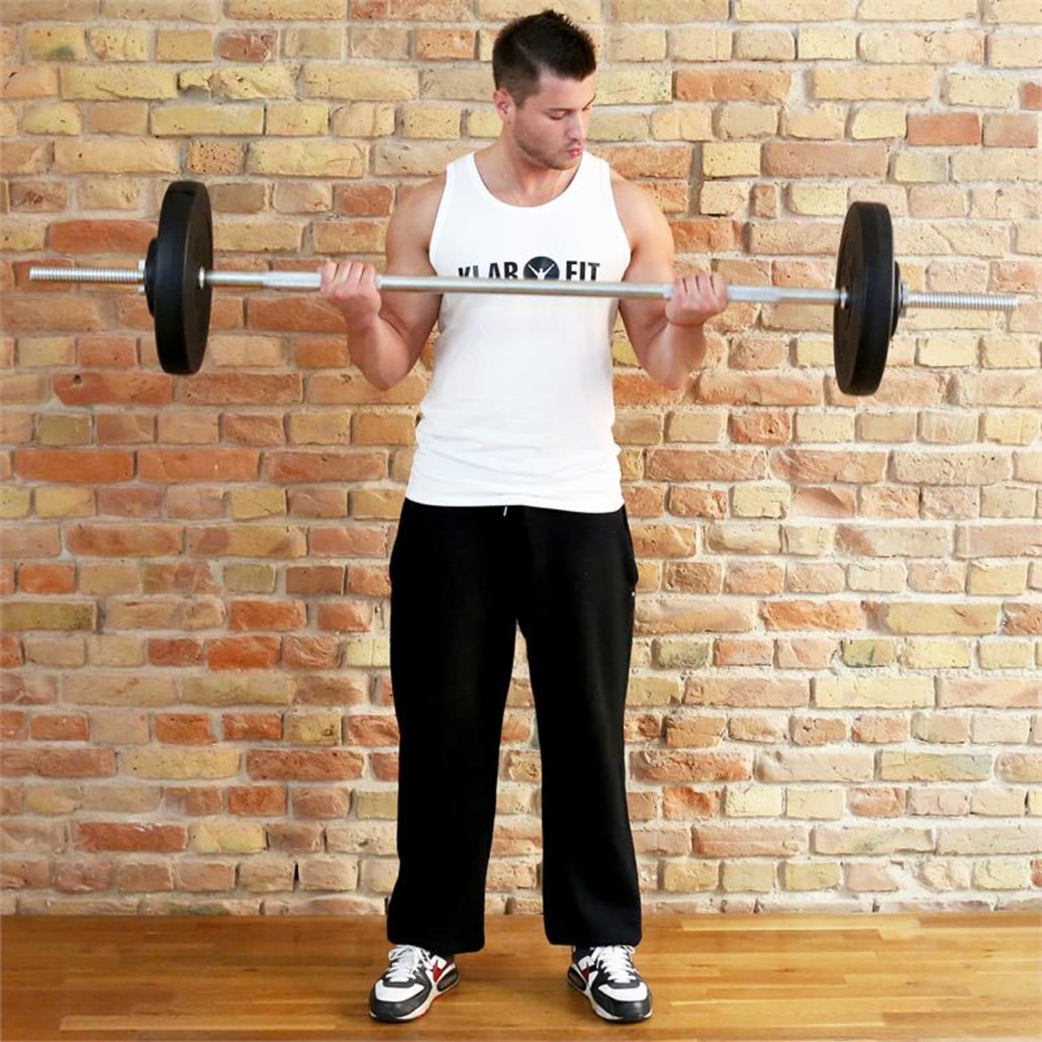 Kétkezes Klarfit páros súlyzó 58,5 kg-os, erősítő padra