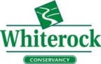 Logo for "WHITEROCK CONSERVANCY"
