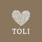 Logo for "TOUCH OF LOVE INTERNATIONAL"