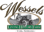 Logo for "Wessels Living History Farm"