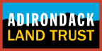 Logo for "ADIRONDACK LAND TRUST INC"