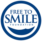 Logo for "FREE TO SMILE FOUNDATION INC"