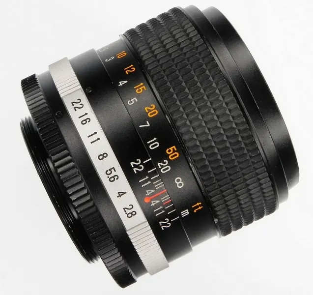 Tominon 100mm f/2.8 Auto