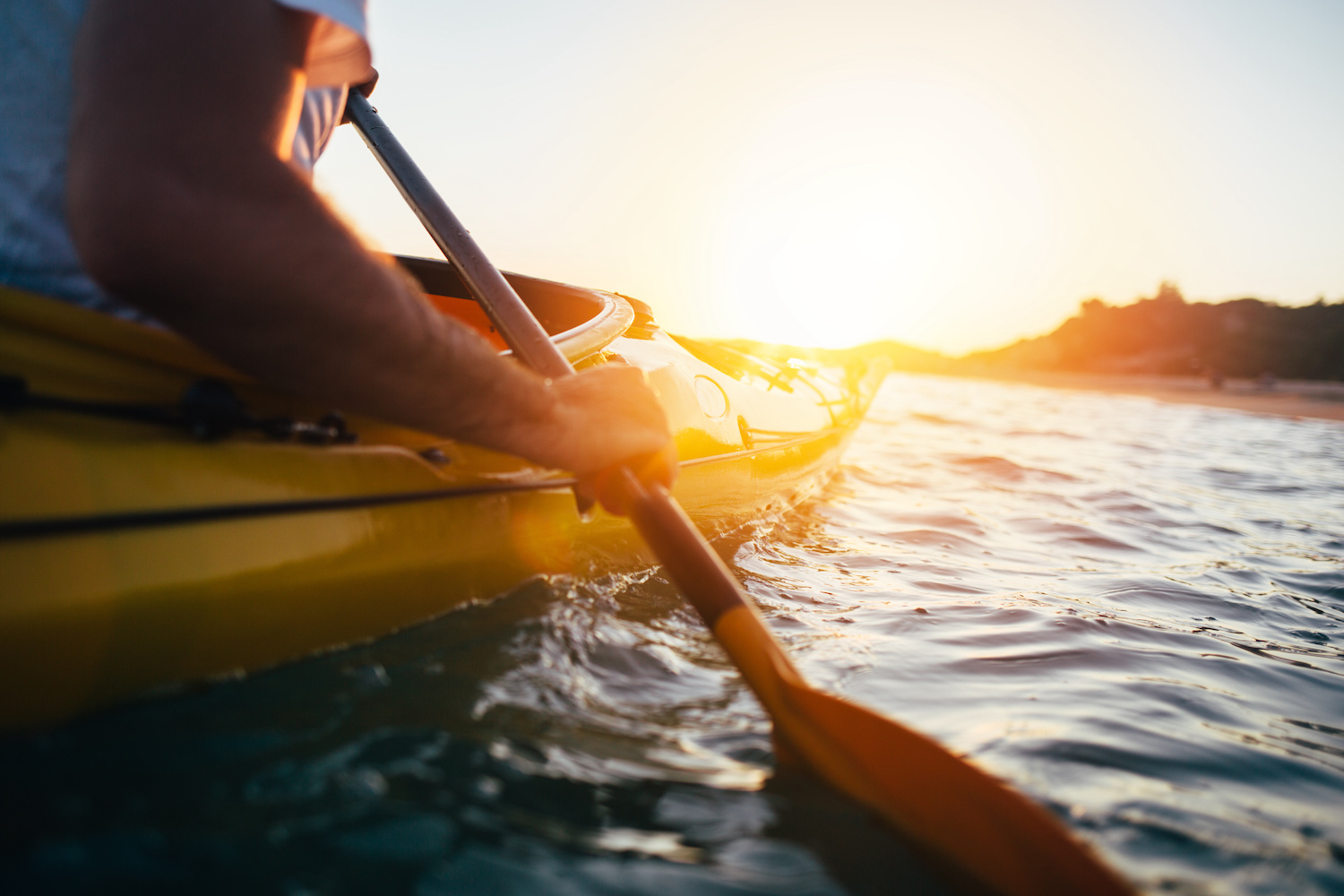 Kayaking im Sonnenuntergang