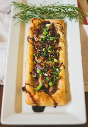 Caramelized Onion and Chanterelle Tart with Balsamic Guinness Glaze Cover Image