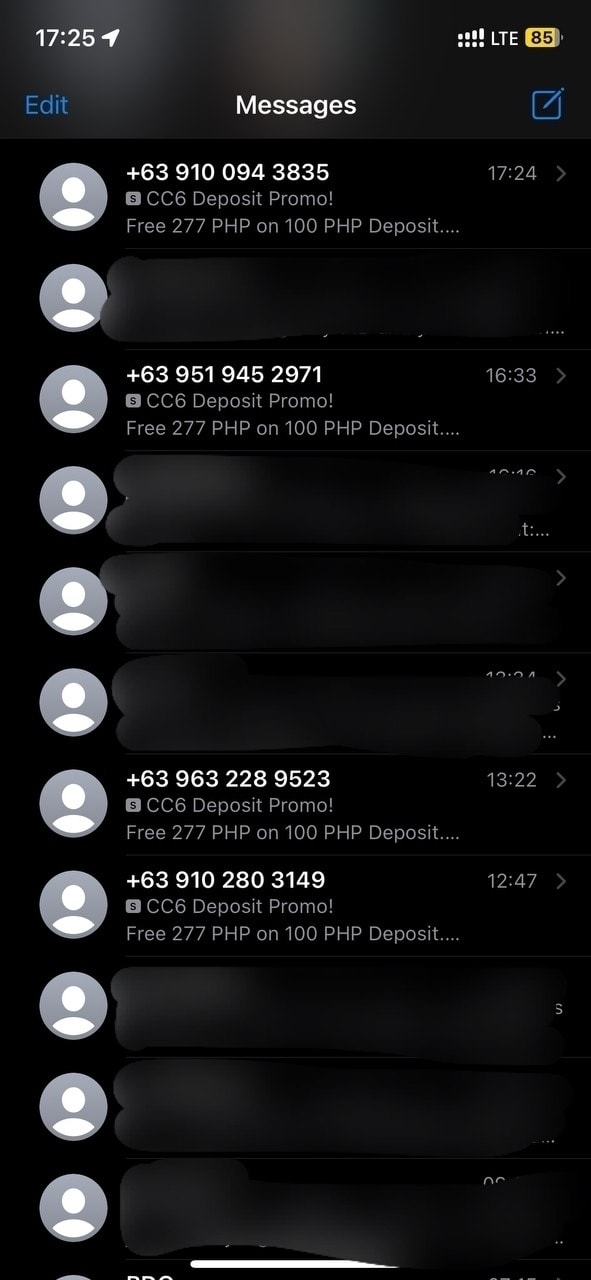 screenshot of Chi's Messages list, with the spam messages from unknown senders shown with full view of the numbers and the rest of her messages blurred out.