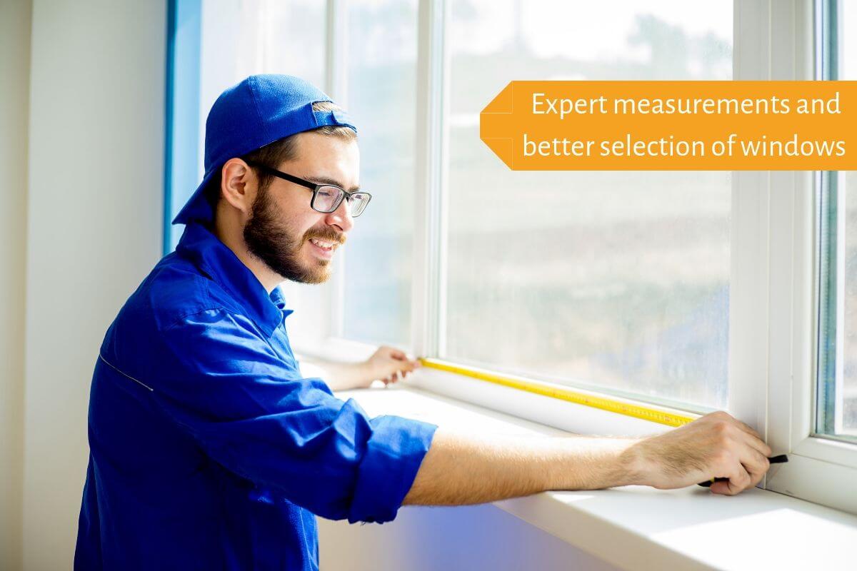 man measuring window