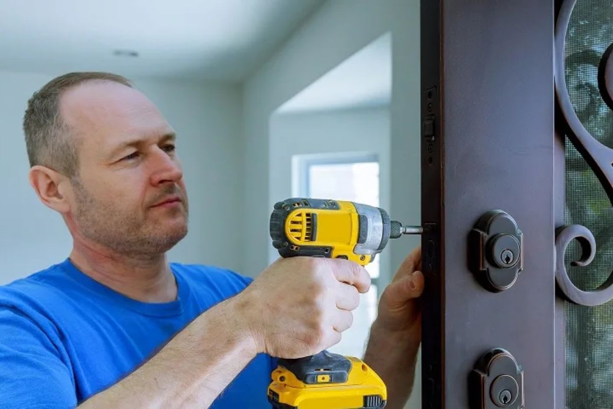 Man Fixing Door