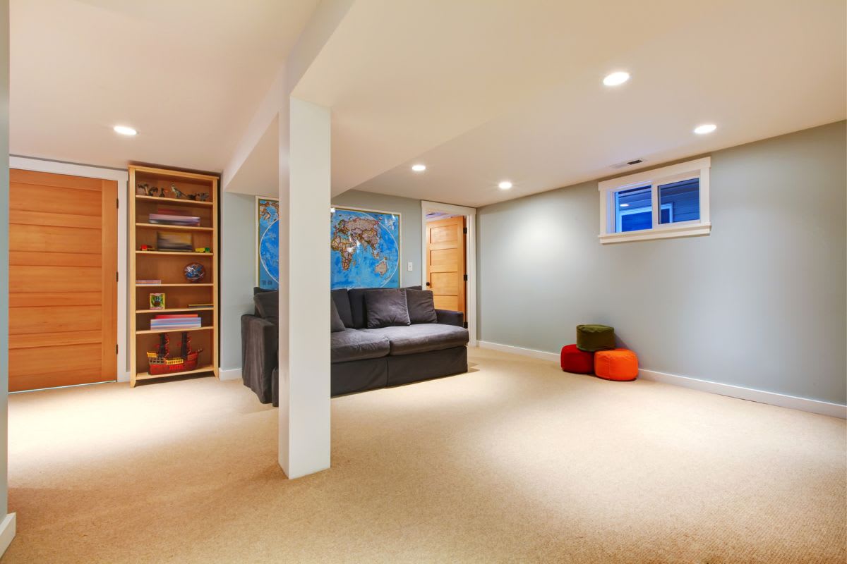 Large Blue Basement Living Room with Sofa