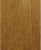 Close-up of a wooden surface showing a natural grain pattern with vertical lines in light brown tones.