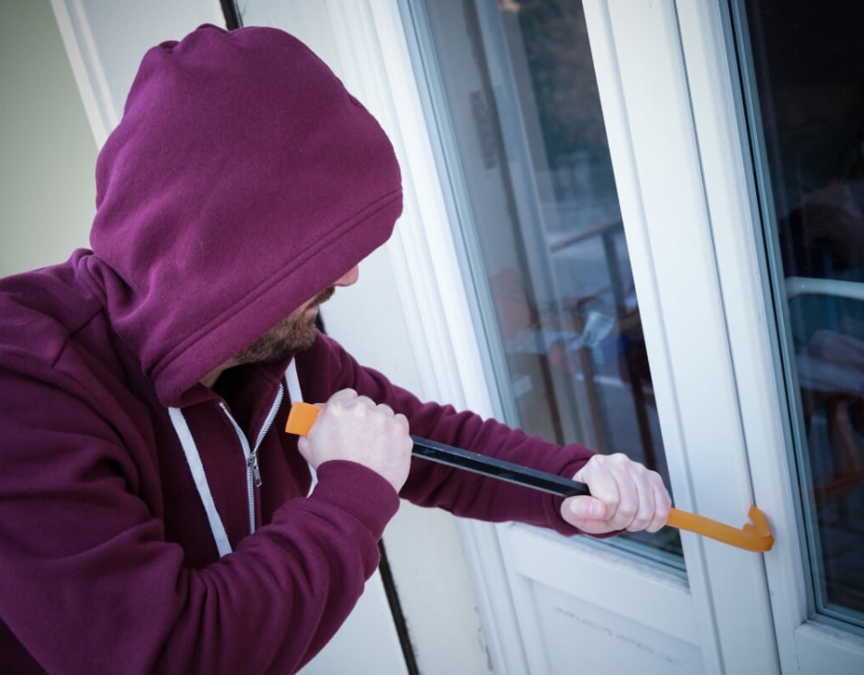 burglar breaking into home