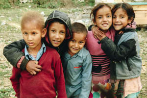 Refugee children smiling for camera