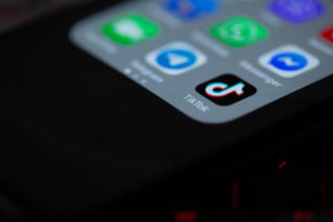Smartphone home screen with TikTok app in focus