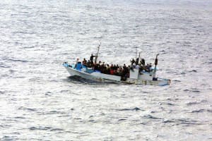 Refugees packed onto a boat