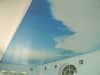 Spanndecke mit Wolkenmotiv im Wellnessbereich