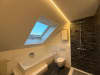 Badezimmer mit Tuch-Spanndecke und LED-Beleuchtung