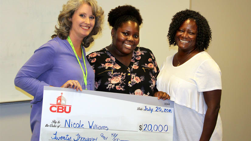 Accounting Career Awareness and Diversity Program participant receives check