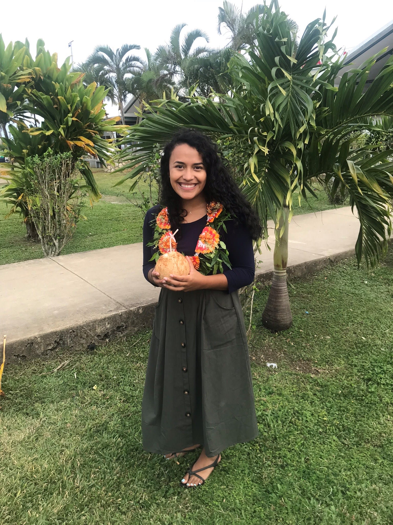 CBU Student Esther Ferreira under a palm tree