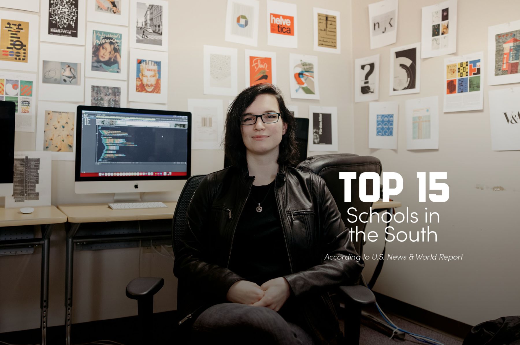 Top 15 Schools in the South according to US News & World Report - Student in front of computers and artwork