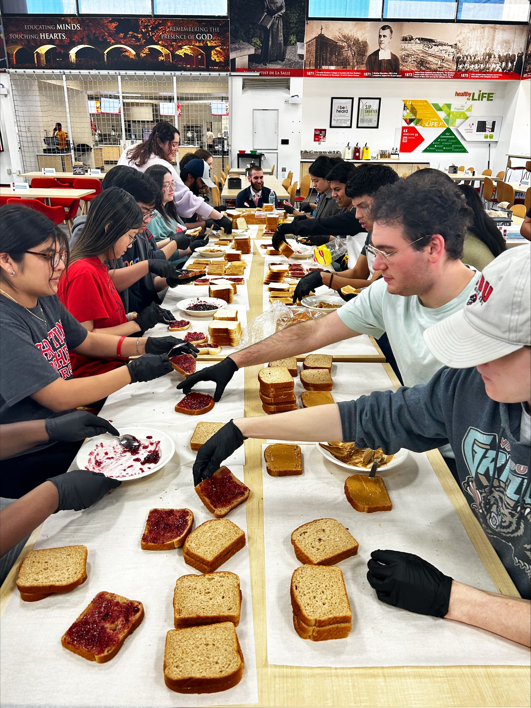 CBU Students making peanut butter and jelly for the local Memphis mission.