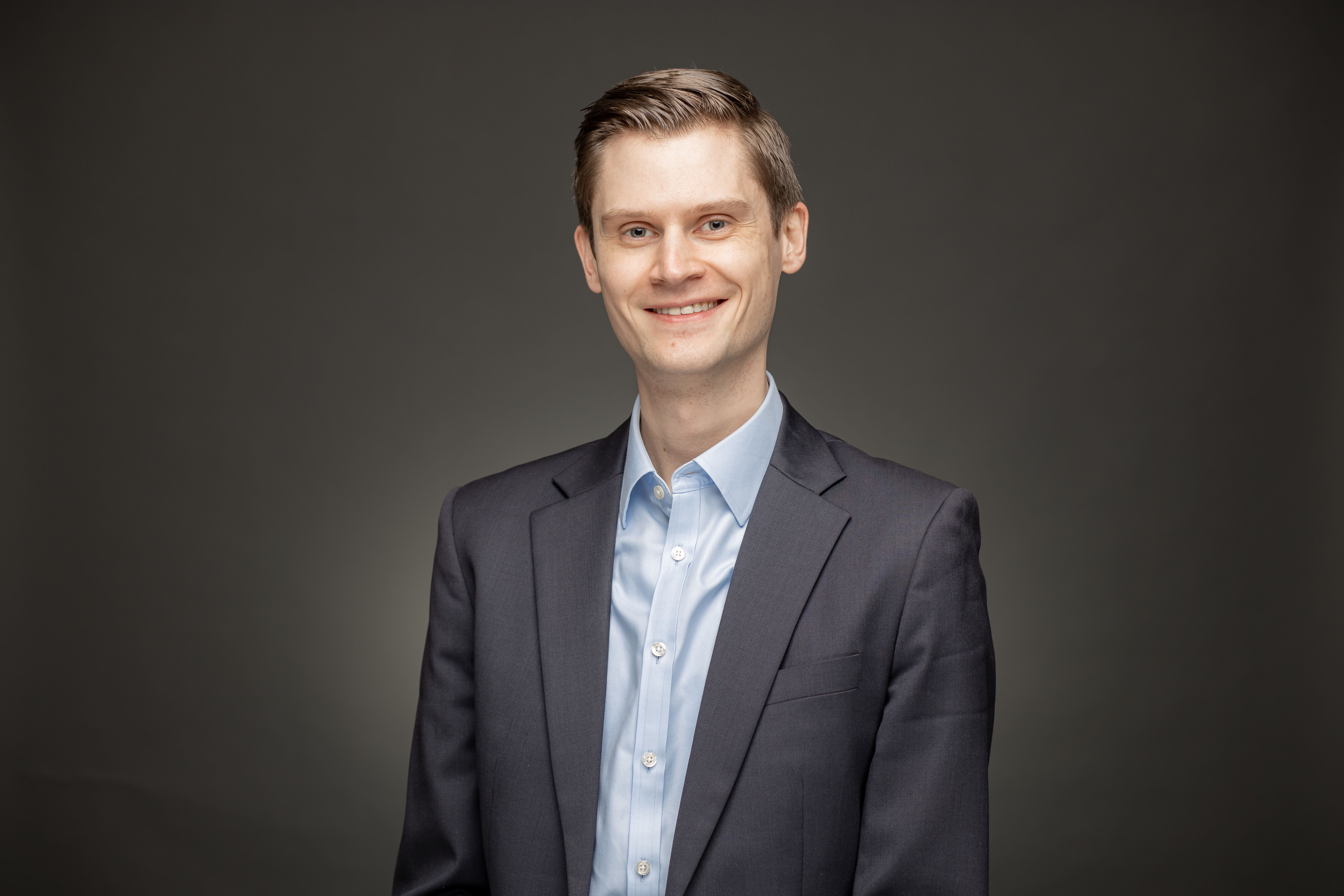 Dr. Alexander  Happ