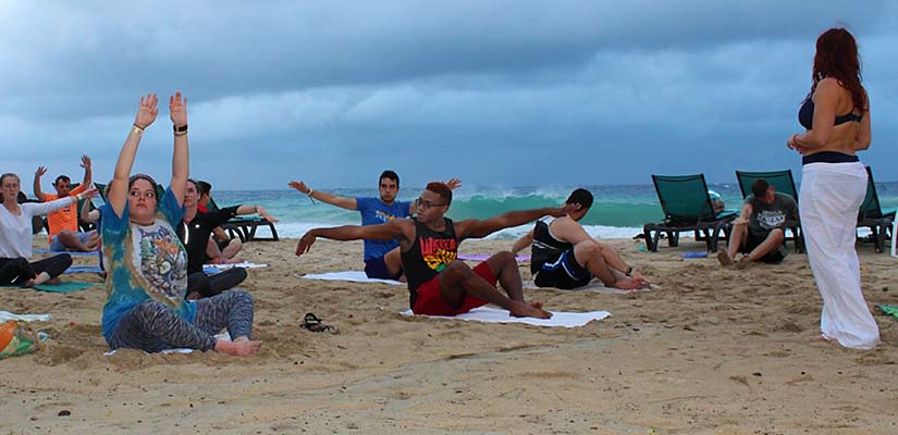 Students exercising on the beach