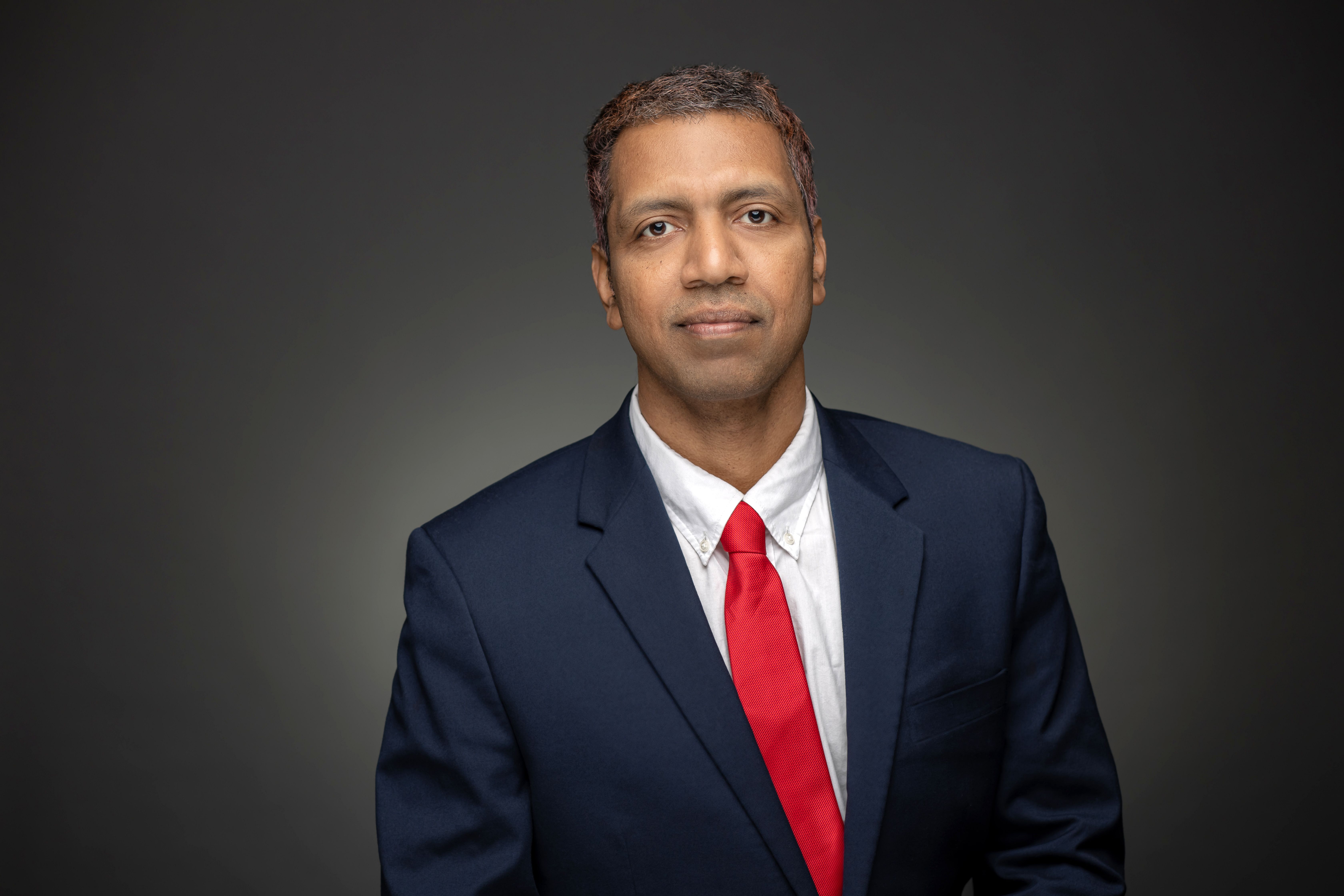 Dr. Babu George