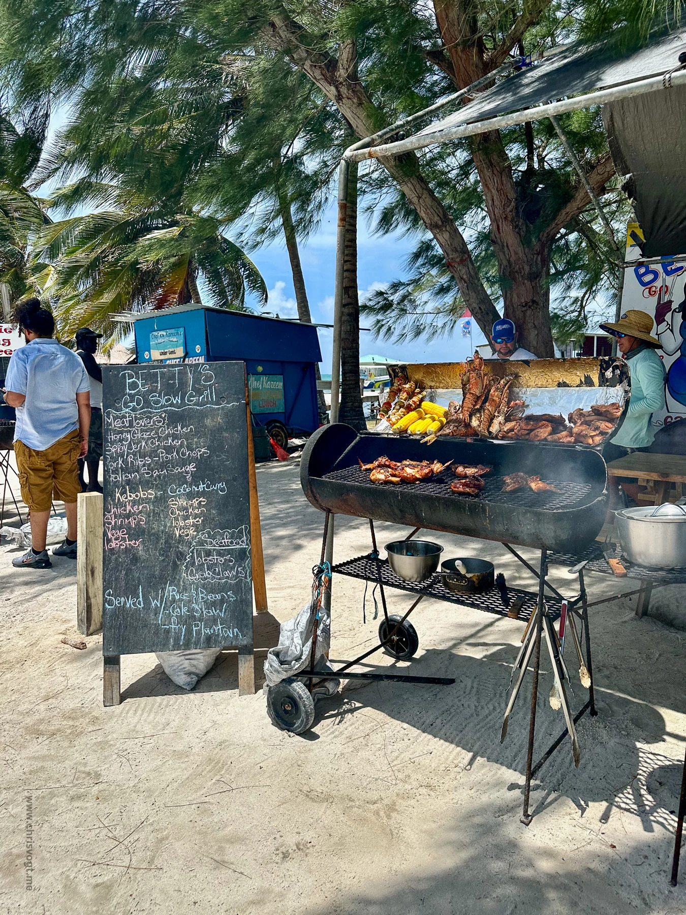 Lobster and chicken on the grill at Betty's Go Slow Grill. In island time, the food is ready when it's perfect.