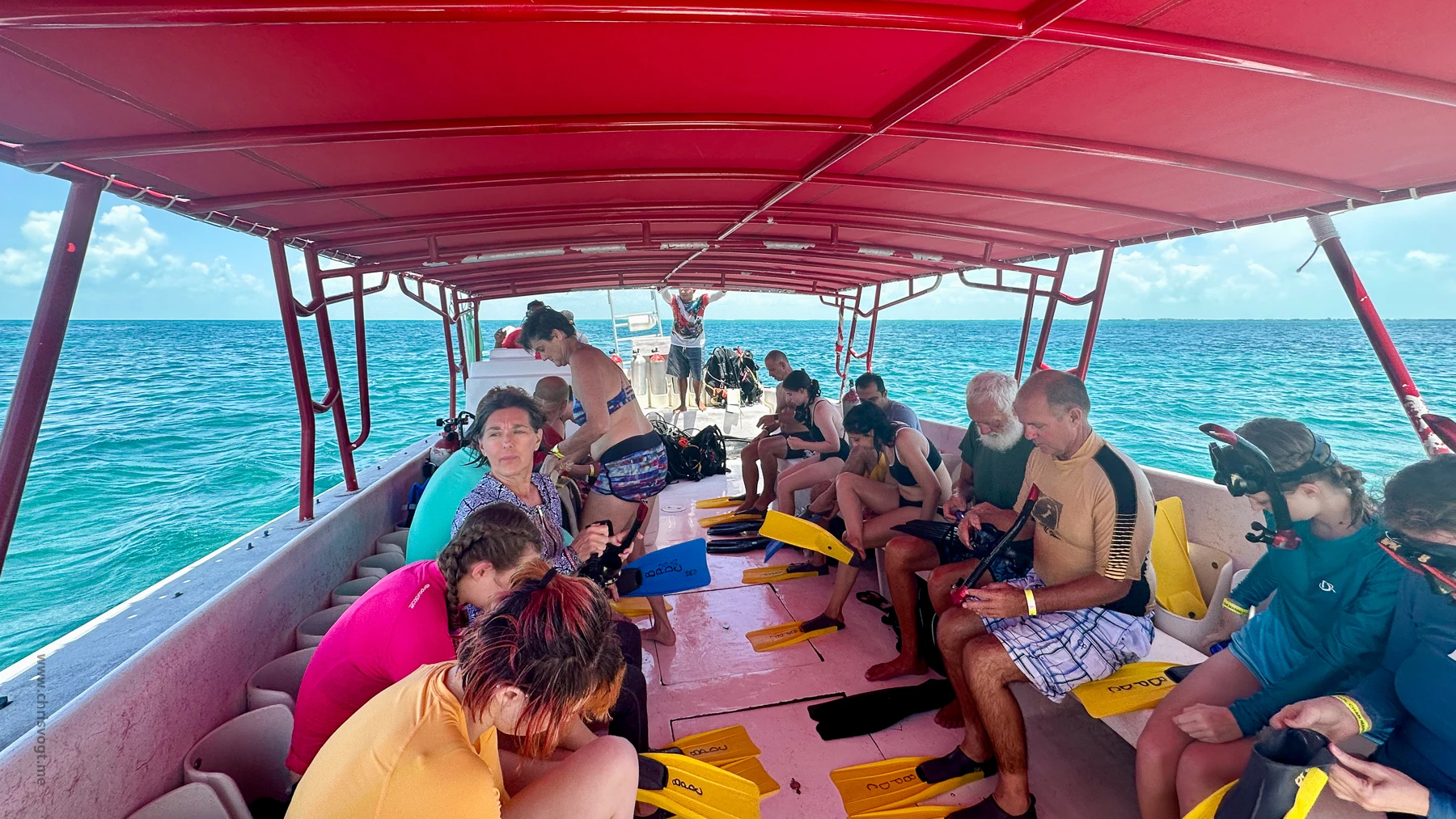 A group of snorkelers prepare to jump into the water with sharks and stingrays at Hol Chan Marine Reserve.