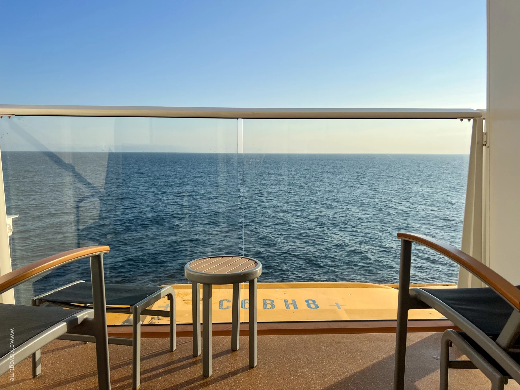 Looking out the balcony of our stateroom as the sun sets