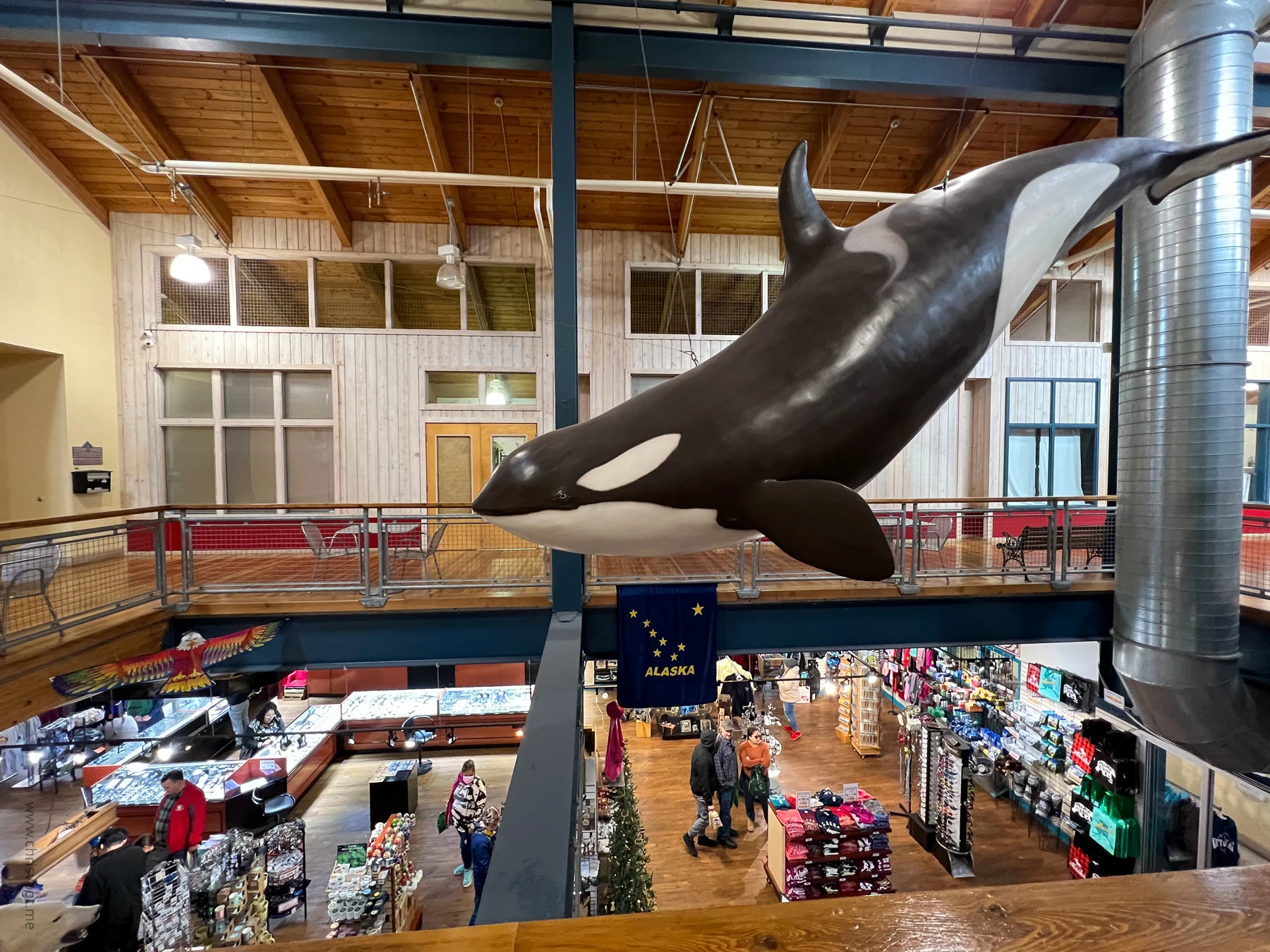 An orca statue suspended in a market in Ketchikan