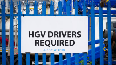 A sign stating 'HGV drivers required, Apply within'.png