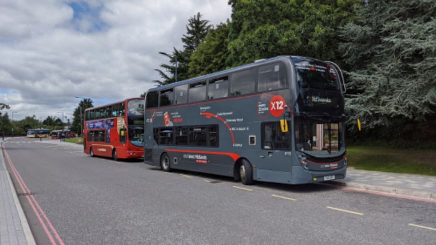 Buses on the side of the road
