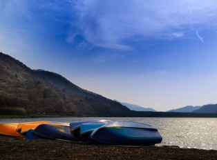 Lake Ashi with canoes laying on the ground