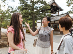 Travelers on a tour in Kyoto, Japan