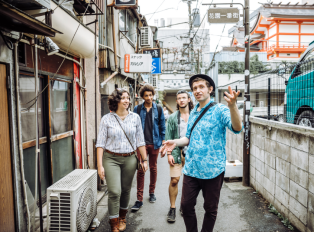 Tourists embarking on a private tour with a local guide