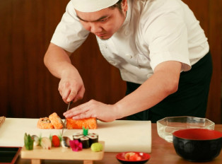 Sushi chef preparing sushi in Tokyo, Japan