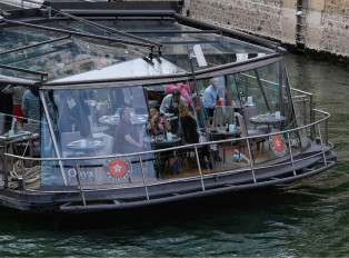 Witness the magic from the deck of a Seine River cruise