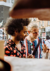 London local host exploring the food scene of Brick Lane with tourists