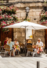 Locals enjoying typical al fresco dining in Madrid