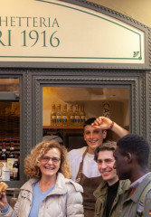 Tourists exploring the food scene of Florence with a local guide