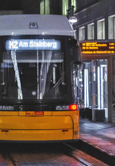 Tourists walking towards their transport at the end of a night tour in Berlin