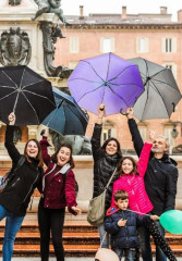 Tourists have a fantastic time on a rainy tour of Italy