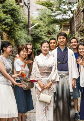 Tourists exploring the alleyways of Japan with a local guide