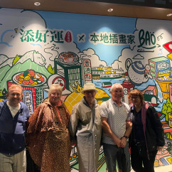 Street Art Smiles – Group Shot by the Colorful Bao Mural