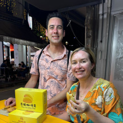 Kelia and companion enjoying their Singapore food day