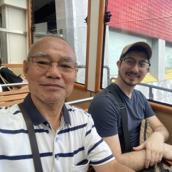 Iconic Peak Tram Ride – Smiling on the Historic Journey Up the Hill